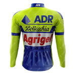 The image displays the 1989 ADR Retro Long Sleeve Cycling Set, featuring a vibrant green and blue design with ADR, Bottecchia, and Agrigel logos. This sleek jersey is part of a performance cycling set, designed for peak cycling performance, with an option for fleece lining.