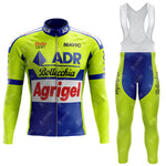The 1989 ADR Retro cycling set includes a vibrant yellow and blue long-sleeve jersey with ADR, Bottecchia, and Agrigel logos, plus matching bib tights. Opt for the fleece version for extra warmth on cooler rides.