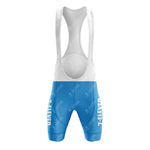 Front view of a blue and white cycling bib short from the 1990s 7-ELEVEN Retro Short Sleeve Cycling Set. The shorts are blue with 7-Eleven in white on each leg, featuring a sheer, white mesh upper with straps.