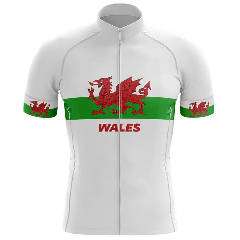 The Old Fart Men Short Sleeve Cycling Set is a white cycling jersey with a green stripe, displaying the red Welsh dragon on the chest and sleeves, plus "WALES" in red below the dragon.
