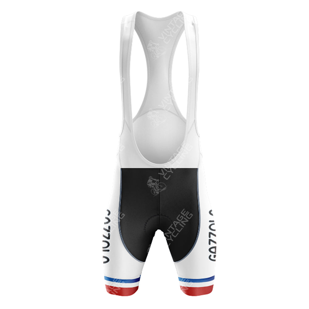Back view of LA REDOUTE Retro Short Sleeve Cycling Set with a white top and black shorts featuring vintage blue and red hem stripes. SYNERGY CYCLES is subtly visible on the fabric.