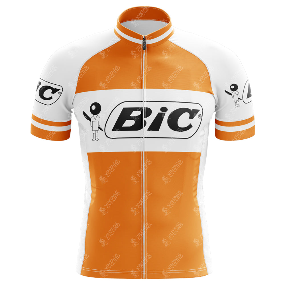The BIC Orange Short Sleeve Retro Cycling Jersey is made of lightweight polyester, featuring a full-length front zipper, a black Bic logo on the chest, and striking orange bands on the sleeves and waist for a classic look.
