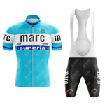The Marc Superia Blue Retro Short Sleeve Cycling Set features a light blue jersey with "marc" text, white details, front zipper, and classic retro style, plus black bib shorts with marc and rainbow graphics on each leg.