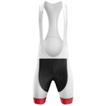 The Believe Men Short Sleeve Cycling Set includes cycling bib shorts with white straps and legs, a black seat area, and red bands around the lower legs, as shown from the back.