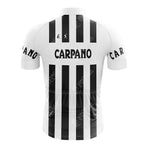Back view of a Cilo Aufina Retro Cycling Set showcasing a vintage-style black and white vertical striped jersey with CARPANO and initials G.S. The short sleeves and collar are white, featuring varying stripe widths.