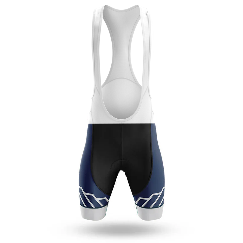 The Slow Cyclist Men Short Sleeve Cycling Set includes a pair of black cycling bib shorts with white straps and navy blue panels featuring white geometric designs—ideal for pairing with the short sleeve jersey or a Chicago flag cycling kit.