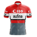 The Clas Cajastur Retro Short Sleeve Cycling Set boasts a striking red, white, and black design. The jersey showcases Cilo on the chest and shoulders, aufina on the front, includes a size guide section, and features short sleeves with a front zipper for optimal comfort.