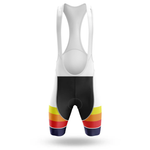 The 3 Feet Men Short Sleeve Cycling Set features bib shorts with a white upper, black midsection, and vibrant orange, yellow, and red stripes on the lower legs; ideal to pair with a moisture-wicking jersey. Displayed on a plain white background.