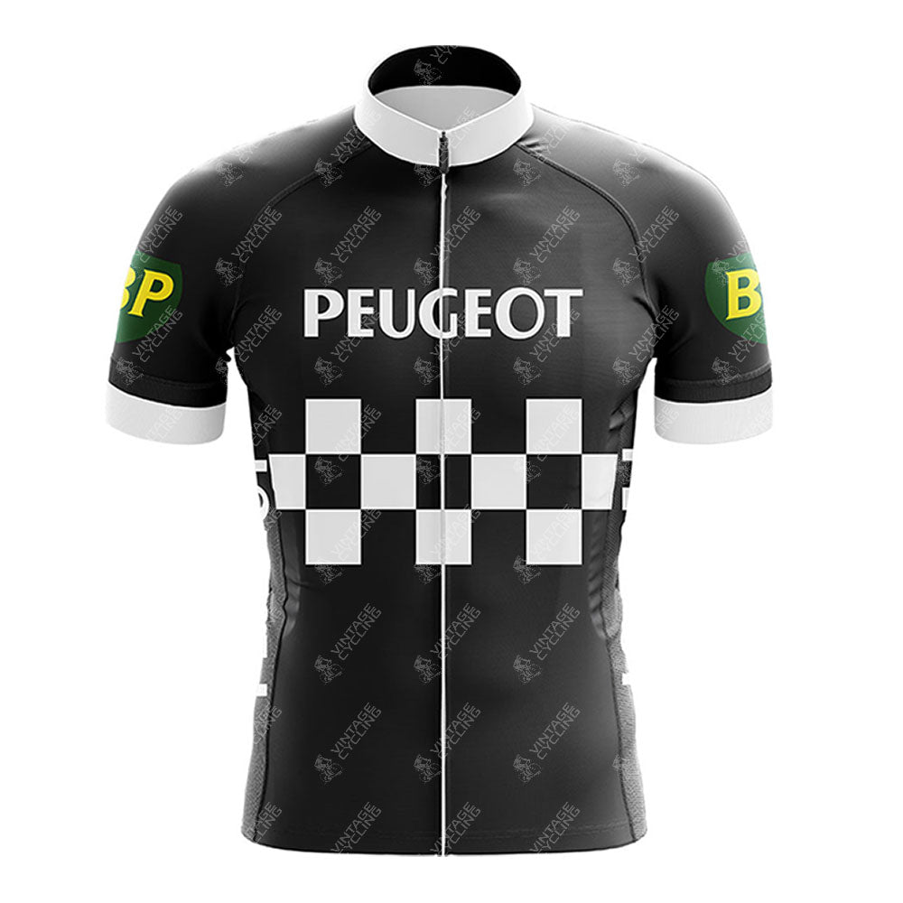 The PEUGEOT Black Retro Short Sleeve Cycling Set features a checkered chest pattern with Peugeot above it. Green and yellow BP logos adorn the white sleeves, and a sleek front zipper completes this standout piece in any vintage cycling collection.