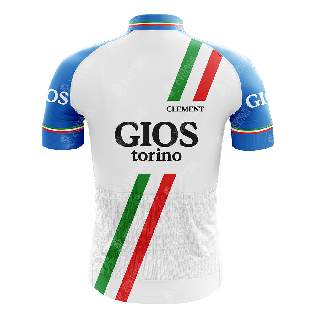 The back of the gan Blue Retro Short Sleeve Cycling Set features a bold GIOS torino print. Mainly white, it has blue shoulders and striking red and green diagonal stripes, with Clement prominently above the logo.