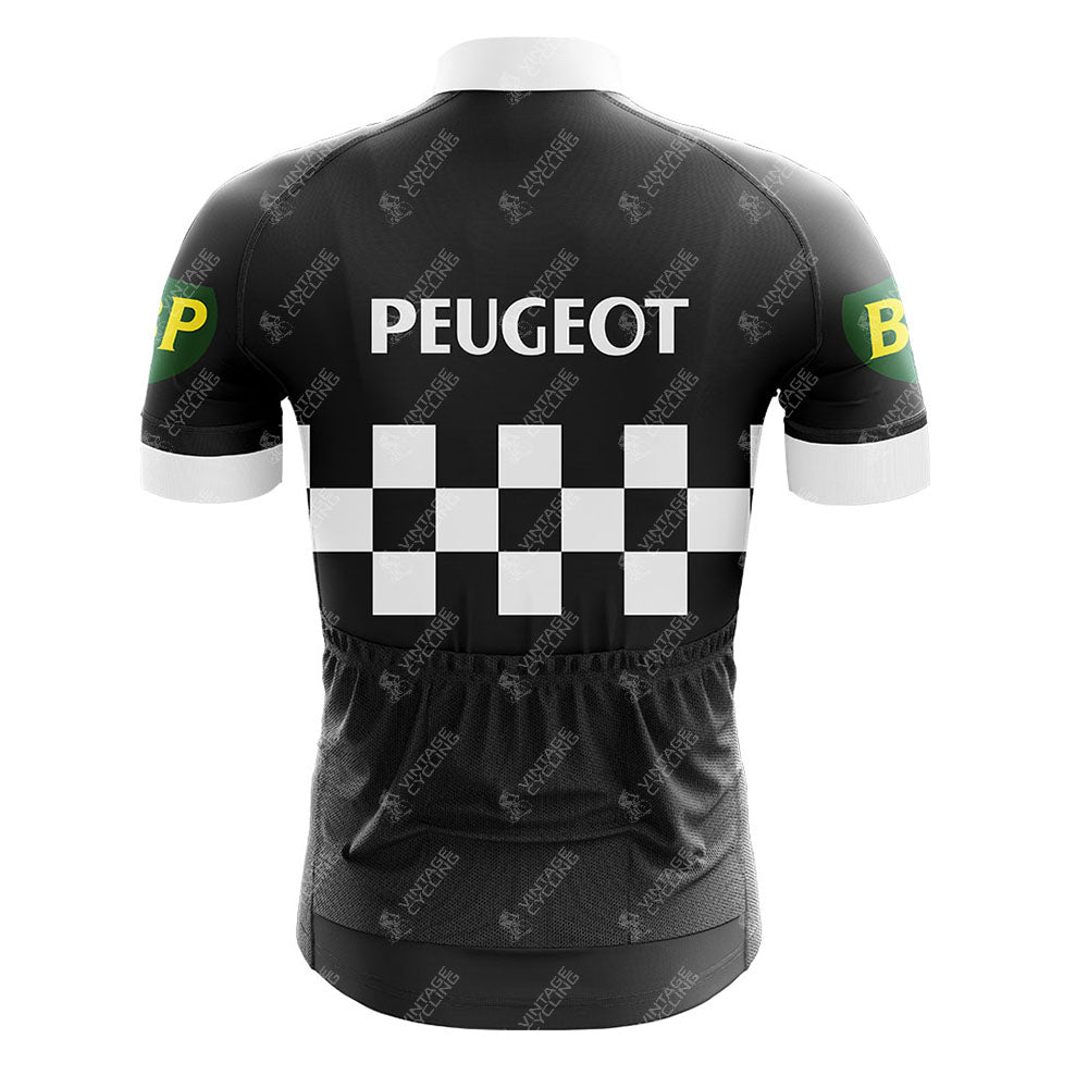 The PEUGEOT Black Retro Short Sleeve Cycling Sets back view showcases a black jersey with PEUGEOT on the upper back, featuring a classic white checkered pattern and green sleeves adorned with BP in bold yellow.