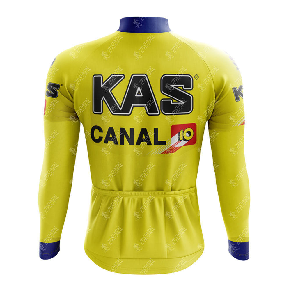 The KAS Retro Long Sleeve Cycling Set features a yellow jersey with KAS CANAL 10 in black and red on the back, blue collar and cuffs, three back pockets, and an optional fleece lining for cooler rides.