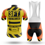 Éire Men Short Sleeve Cycling Set shown from the back, featuring a yellow and black jersey with bold caution graphics, safety messages including "3 FT. IT'S THE LAW SHARE THE ROAD," and matching shorts.
