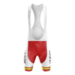 Front view of a red and white cycling bib shorts, with wide shoulder straps, part of the LEROUX Green Retro Short Sleeve Cycling Set. The shorts have LYNFIRE CYCLANE in white down the sides and a yellow hem stripe.