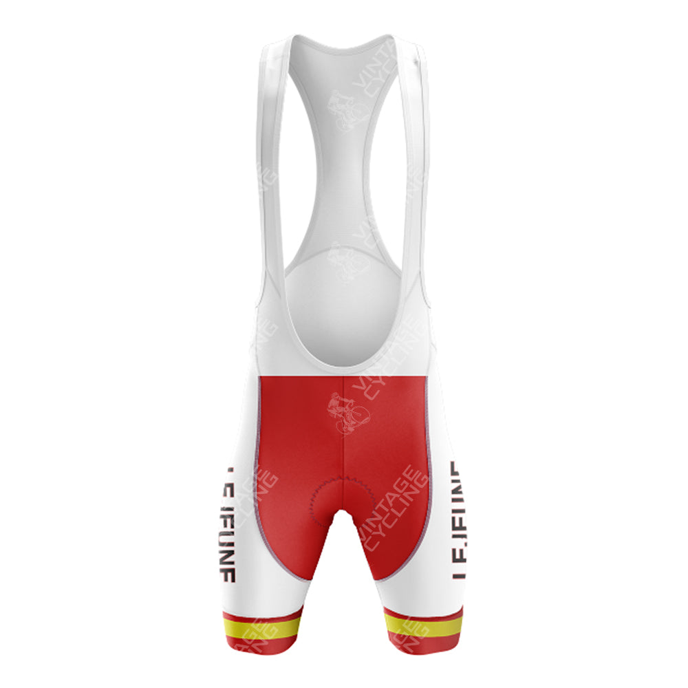 Front view of a red and white cycling bib shorts, with wide shoulder straps, part of the LEROUX Green Retro Short Sleeve Cycling Set. The shorts have LYNFIRE CYCLANE in white down the sides and a yellow hem stripe.