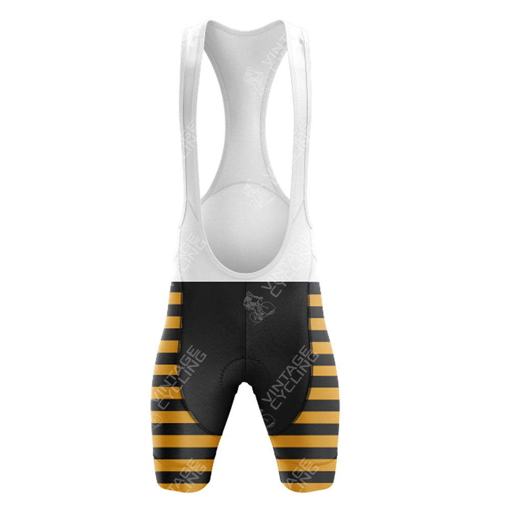 The MOLTENI ARCORE Retro Short Sleeve Cycling Set features black bib shorts with a white upper, yellow horizontal stripes on the lower legs, and VINTAGE CYCLING in white on both legs for a classic retro look.