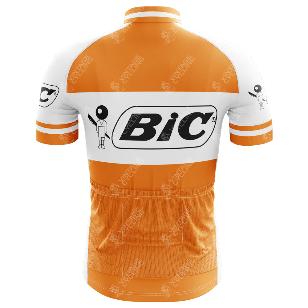The image highlights the BIC Orange Short Sleeve Retro Cycling Jerseys back, made from lightweight polyester with short sleeves and visible stitching. It has a snug fit, a central Bic logo, and features a full-length front zipper for enhanced comfort.