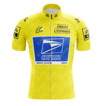 The EPEDEX Tricatel Retro Short Sleeve Cycling Set is a yellow jersey with Tour de France and sponsor logos, such as Credit Lyonnais, USPS, Berry Floor, and AMD. It features a zip-up front and short sleeves.