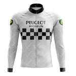 The PEUGEOT Retro Long Sleeve Cycling Set features a white jersey with a black collar, PEUGEOT and MICHELIN logos on the chest above a checkered pattern. Made from lightweight polyester, the sleeves display green and yellow circular BP logos against a plain backdrop.