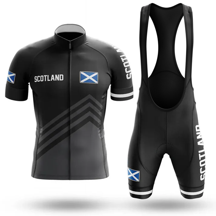 The Drinking Men Short Sleeve Cycling Set features a black men's jersey with SCOTLAND text, Scottish flag, front zipper, and matching bib shorts with shoulder straps and white accents—a tribute unlike any Chicago flag jersey.