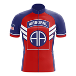 The Retirement Plan Men Short Sleeve Cycling Set is a red, blue, and white performance cycling kit with "AIRBORNE" above a blue circle featuring AA, white chevrons, and a US flag patch on the left sleeve.