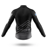 The Belgium Men Long Sleeve Cycling Jersey is shown from the back in black, with subtle chevron patterns, white text on the right sleeve, and a blue-and-white patch on the left upper arm—perfect for cool-weather rides.