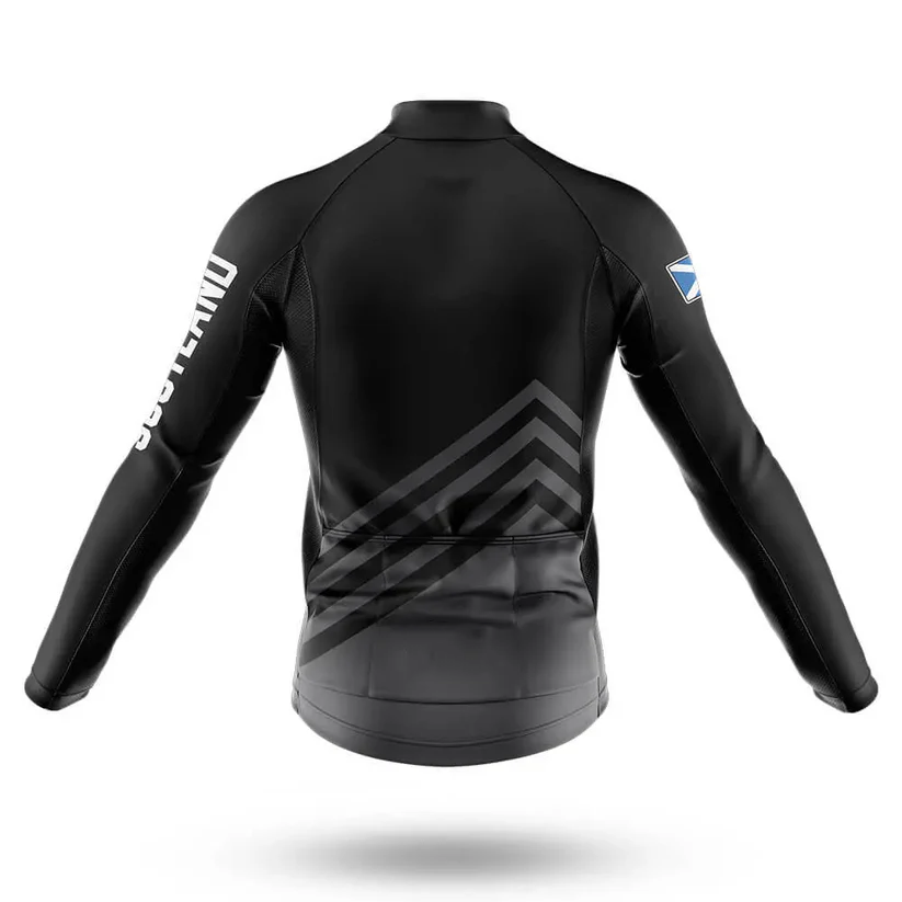 The Belgium Men Long Sleeve Cycling Jersey is shown from the back in black, with subtle chevron patterns, white text on the right sleeve, and a blue-and-white patch on the left upper arm—perfect for cool-weather rides.