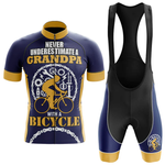 The "Don't Run Me Over Safety" short sleeve cycling set features a blue and yellow customizable jersey with “Never underestimate a grandpa with a bicycle” and matching bib shorts, creating a bold retro look for cyclists.