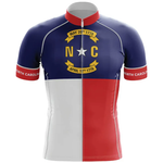 A men’s short sleeve cycling set designed like the Portugal flag, featuring green and red panels, a yellow shield with national symbols, and “Portugal” written on both sleeves.