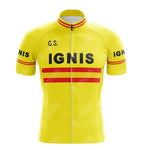 Part of the Jacky Aernoudt Meubel Rossin Retro Cycling Set, this cycling jersey features a bright yellow base with bold red stripes on the chest and sleeves. IGNIS is displayed in bold black letters on the front, along with G.S. initials. Red and yellow stripe patterns adorn the collar and sleeves.