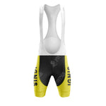 The Jacky Aernoudt Meubel Rossin Retro Short Sleeve Cycling Set features sleek black and yellow bib shorts with bold IGNIS branding on the yellow sections. A supportive white upper ensures comfort, making it ideal for pairing with a matching jersey for enhanced style and performance.