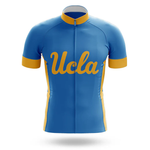 A men's short-sleeve cycling jersey set inspired by the Chicago flag, blue with gold trim on sleeves and sides, featuring "USC" in large gold script across the chest.