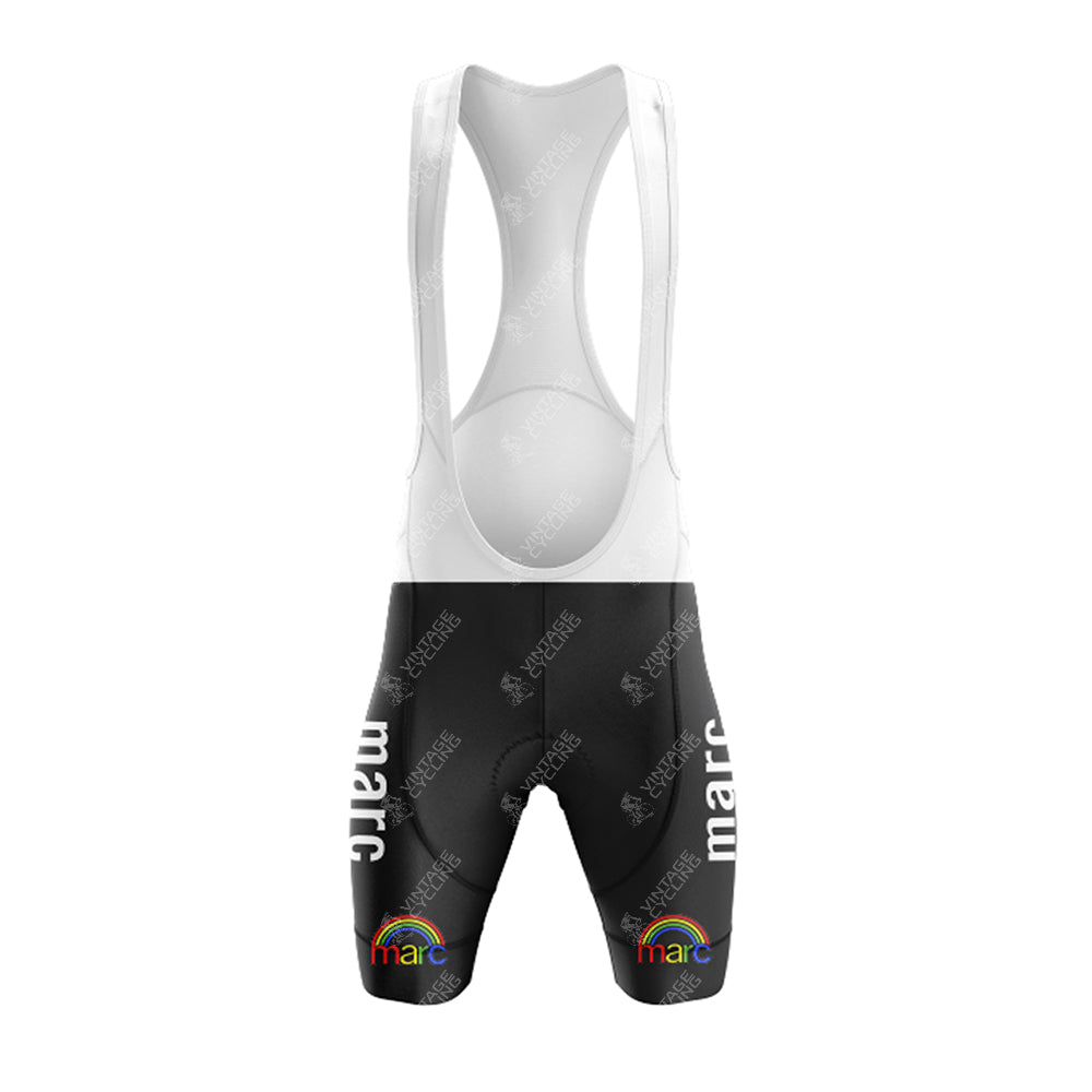 Pair these black bib shorts with white straps, "marc" in white on each leg, and a rainbow logo at the hem with the Marc Superia Blue Retro Short Sleeve Cycling Set (Copy) for a classic retro cycling look.