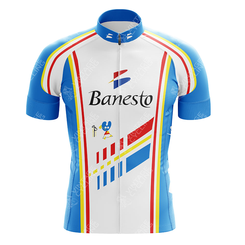 The FESTINA Retro Cycling Jersey features a striking blue, white, red, and yellow design with Banesto branding on the front. It includes short sleeves and a full-length front zipper for optimal performance.