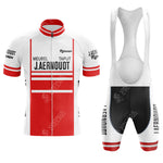 The Jacky Aernoudt Meubel Rossin Retro Short Sleeve Cycling Set features a red and white jersey with bold black text, paired with stylish black and white bib shorts adorned with iconic side lettering.