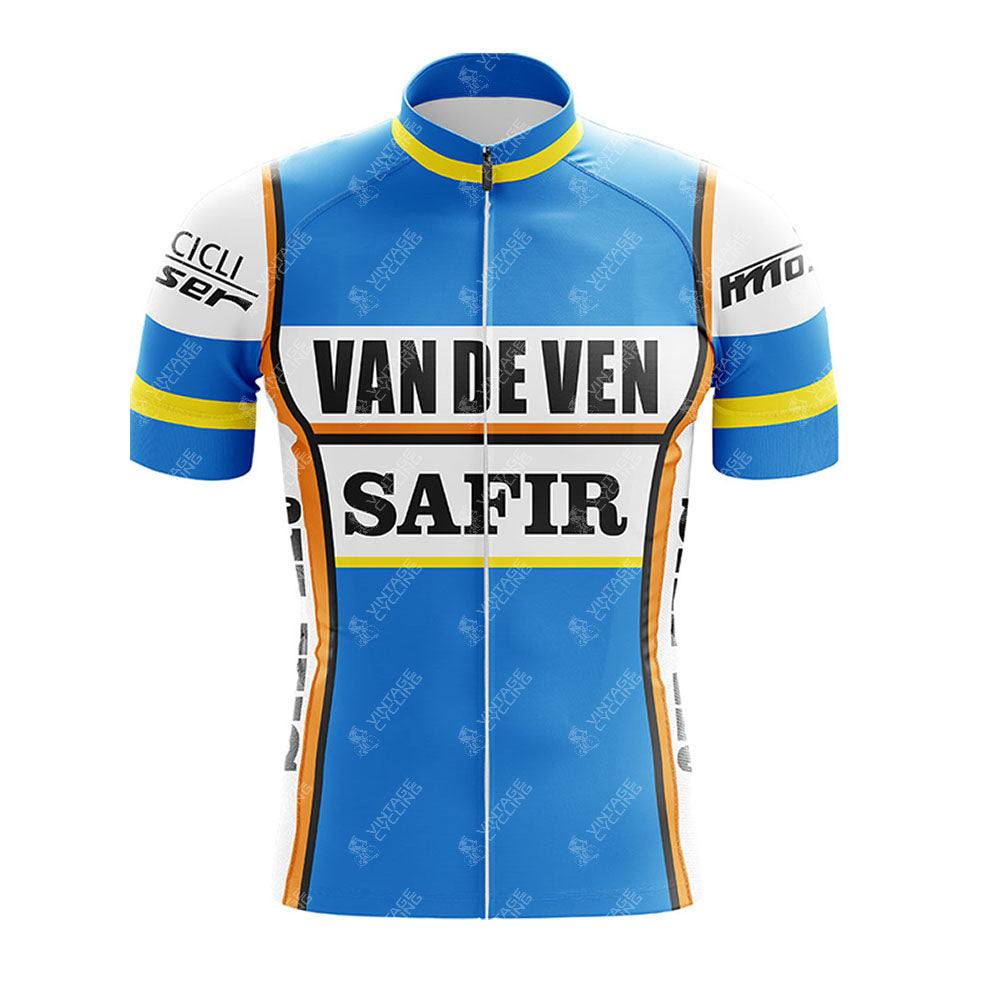 The Salvarani 1972 Retro Short Sleeve Cycling Set features a vintage blue jersey with yellow and white accents, SALVARANI boldly printed on the front, and classic sponsor logos on the sleeves and shoulders.