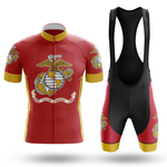 The Marines Men Short Sleeve Cycling Set features a red jersey and matching bib shorts with the USMC emblem, gold trim on sleeves, collar, and legs. Displayed on a white background, it's perfect for dedicated Marine Corps cyclists.