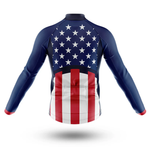 The Packers Long Sleeve Cycling Jersey features an American flag design with white stars on a blue upper section and red and white vertical stripes on the lower half, displayed from the back.