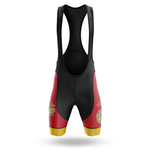 The Marines Men Short Sleeve Cycling Set features black, red, and gold bib shorts with shoulder straps and US Marine Corps logos on each thigh, shown against a white background.