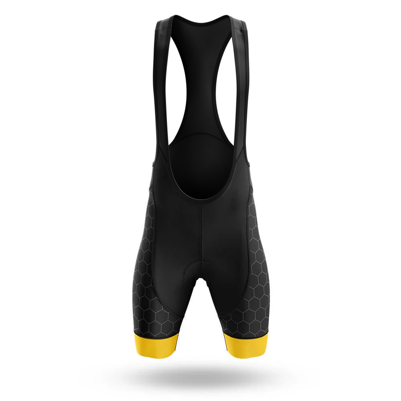 The Sloth And Turtle Men Short Sleeve Cycling Set features black bib shorts with shoulder straps, a subtle hexagonal leg pattern, yellow leg bands, and a matching men's short sleeve Chicago flag jersey. Shown on a white background.