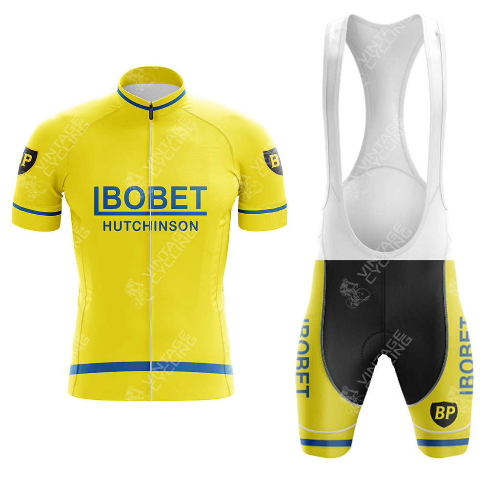 The Maes-Pils Rokado Retro Short Sleeve Cycling Set features a vintage jersey and bib shorts with Bobet Hutchinson and BP. The jersey is short-sleeved, while the yellow bib shorts have a white upper section displaying Bobet and BP.