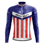 The Brooklyn Chewing Gum Retro Cycling Jersey Long Set (with Fleece Option) showcases red and white stripes on the lower half, a blue upper, and BROOKLYN in white. It features a cyclist graphic inspired by Roger de Vlaemincks era.