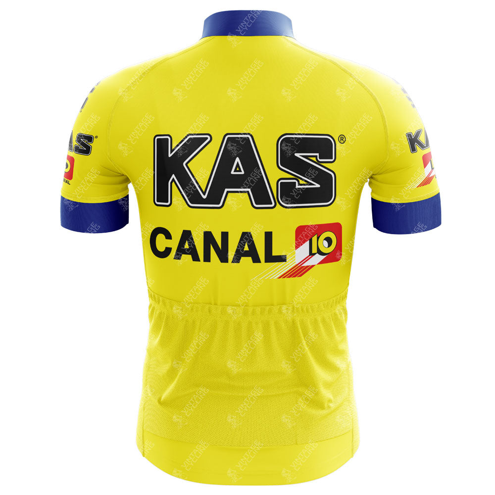 The KAS Retro Short Sleeve Cycling Set sports KAS and Canal 10 logos in black and red, featuring a vivid yellow color with bold blue accents on the sleeves and collar, perfect for vintage cycling enthusiasts.