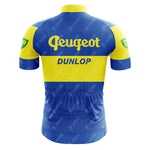 The Reynolds Aluminio Blue Retro Short Sleeve Cycling Set features a blue and yellow breathable design with blue Peugeot, yellow Dunlop, and green/yellow BP logos on the back and sleeves for a classic retro look.
