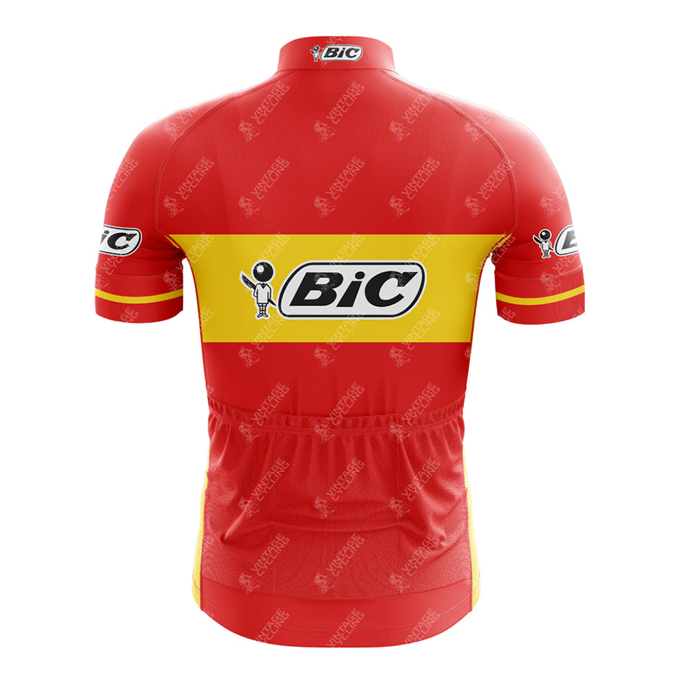 Back view of the BIC Red Retro Short Sleeve Cycling Set, showcasing a red gradient vintage jersey with a yellow stripe and Bic logo, featuring short sleeves, high collar, and back pockets.