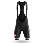The Sloth Team Men Short Sleeve Cycling Set features a black jersey and bib shorts with shoulder straps, "AUSTRIA" printed vertically on the right thigh, and an Austrian flag design on the left leg, displayed against a white background.
