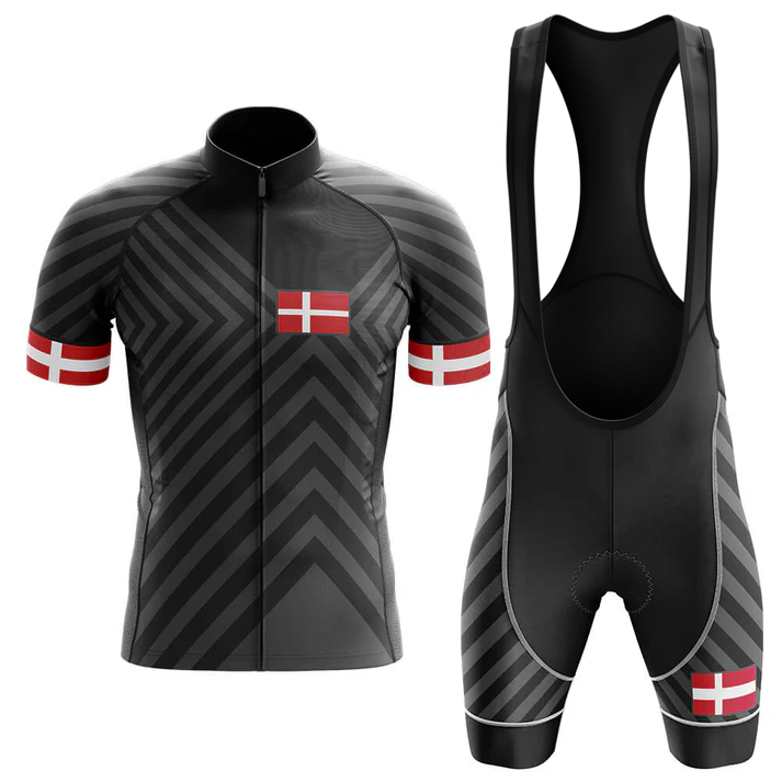 The Therapy Men Short Sleeve Cycling Set features diagonal grey stripes, Danish flags on the chest and sleeves, a moisture-wicking jersey, matching bib shorts, and solid black suspenders for comfort and style.