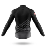 USMC Cycle Corps Men Long Sleeve Cycling Jersey shown from the back with white text on the right sleeve and a red-and-white patch on the left upper arm—ideal for cool-weather rides. Displayed on a white background.