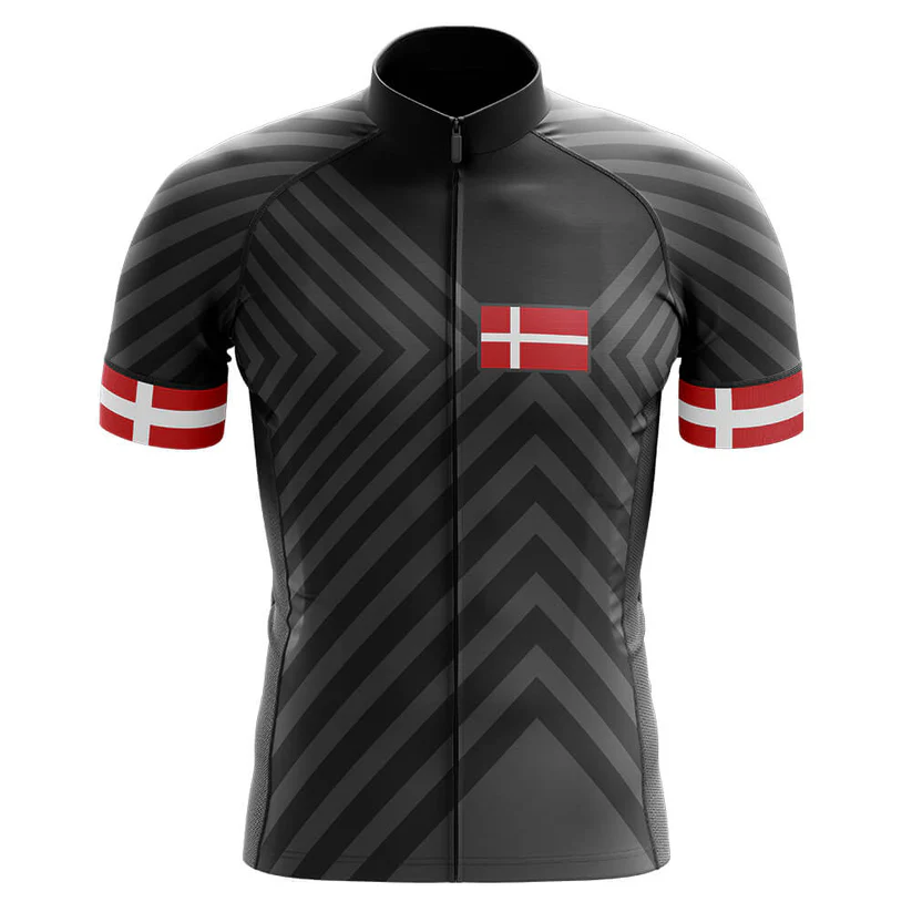 The Therapy Men Short Sleeve Cycling Set is a black, moisture-wicking jersey with bold gray chevrons and Denmark’s flag on the chest and sleeves, each designed with a striking red band and white cross for standout style.