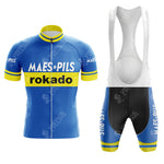 Retro cycling enthusiasts will love the Mars Flandria Retro Short Sleeve Cycling Set, a blue jersey with yellow accents and MAES PILS and rokado text. The matching bib shorts complete the vintage style, adorned with subtle background logos.